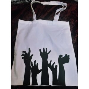 Black and white zombie hands tote bag